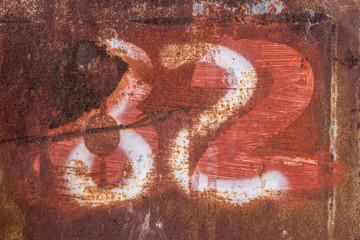 numbers painted in rusty metal, scratched rusty metal texture, number two, number eight