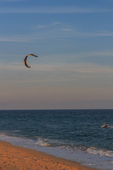 A good afternoon to practice Windsurfing and Kitesurfing (Flysurf) at Cabrera beach at sunset with the waves of the sea at your point.