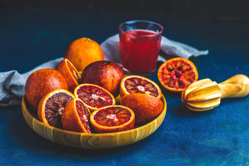 Shorts of alcohol cocktail with Sliced Sicilian Blood oranges and fresh red orange juice