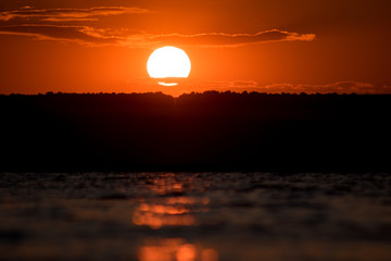 Obraz premium red sunset over the sea