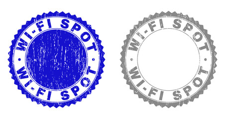 Grunge WI-FI SPOT stamp seals isolated on a white background. Rosette seals with grunge texture in blue and gray colors. Vector rubber stamp imitation of WI-FI SPOT caption inside round rosette.