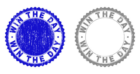 Grunge WIN THE DAY stamp seals isolated on a white background. Rosette seals with distress texture in blue and grey colors. Vector rubber stamp imitation of WIN THE DAY caption inside round rosette.