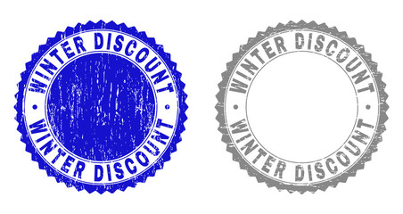 Grunge WINTER DISCOUNT stamp seals isolated on a white background. Rosette seals with grunge texture in blue and grey colors. Vector rubber stamp imitation of WINTER DISCOUNT tag inside round rosette.