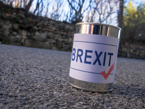 Brexit Tin Can In The Road Ready For A Kick, UK EU Politics Metaphor Or Concept.