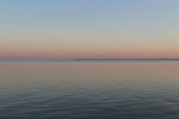 the North Sea, dipped in the evening sun in pastel colors