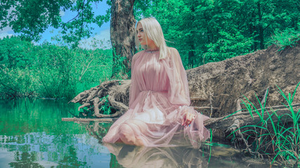 The girl in the forest. The girl on the lake.