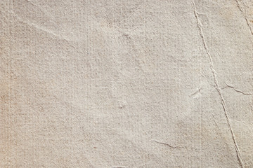 Texture of old yellowed and crumpled paper. Grunge and retro background with space for text or image. Empty template and mockup for designers.	