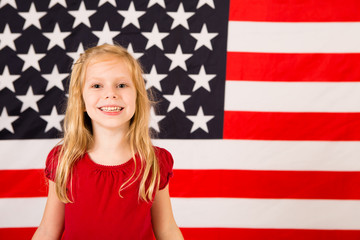 Happy Little Girl by American Flag - Room for Text