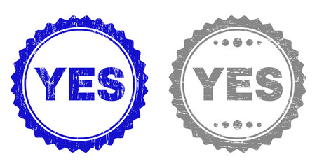 Grunge YES stamp seals isolated on a white background. Rosette seals with distress texture in blue and gray colors. Vector rubber stamp imprint of YES text inside round rosette.