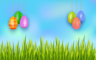 Happy Easter hanging painted eggs on sky background with green grass. Poster template with copy space. Vector illustration