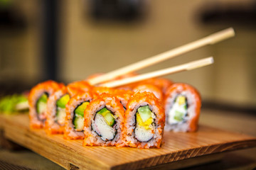 sushi with chopsticks