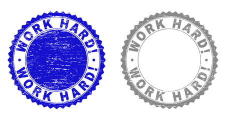Obraz premium Grunge WORK HARD! stamp seals isolated on a white background. Rosette seals with grunge texture in blue and grey colors. Vector rubber stamp imprint of WORK HARD! label inside round rosette.
