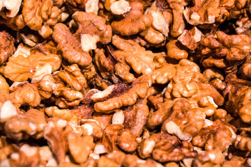 Background and texture. It is a lot of walnuts. Healthy and useful food, vitamins. Diet. Tasty.