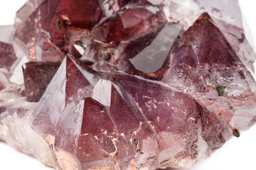 Macro mineral stone Amethysts, Goethite, Epidote on a white background