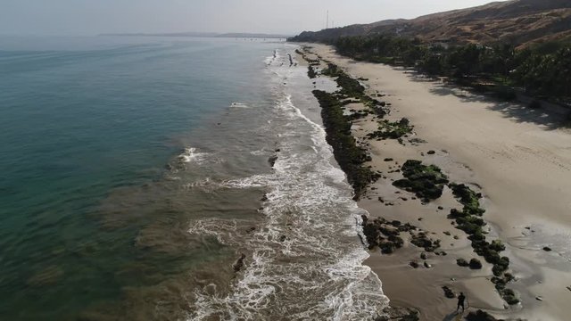 Aerial: Mancora beach at the Pacific Ocean. Peru, South America