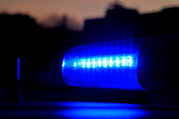 police. Ambulance. flasher blue. close-up. there is toning