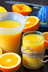 Freshly squeezed orange juice. Citrus juicer.