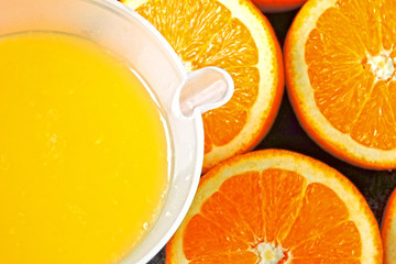 Freshly squeezed orange juice. Citrus juicer.