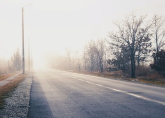 Fototapeta na wymiar The road in fog.