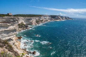 Fototapeta na wymiar Rocky cliffs from the sea near Bonifacio in the south of the island of Corsica
