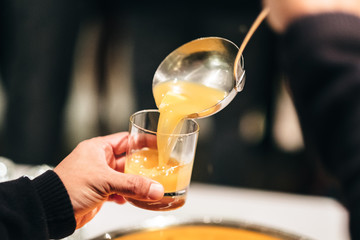 Juice served by the glass during a festive event
