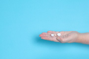 Pills on a palm