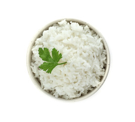 Bowl of boiled rice on white background, top view