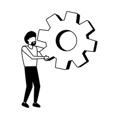 businessman holding gear wheel