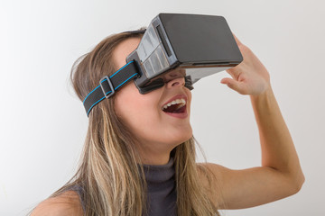 Woman looking with VR device and feeling excite