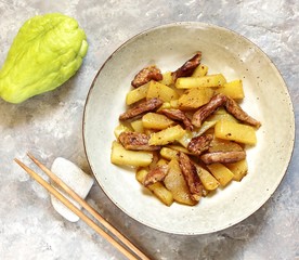 chayote with beef and sesame in asian style. The dish is popular in Asia, especially in Vietnam. recipe with chayote. copy space. place for text. top view