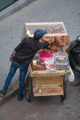 Man working with his street food cart, Beirut, Lebanon, Middle East