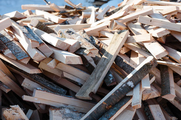 Fototapeta na wymiar Wood waste. Wreck boards. Waste from the boards. Firewood.