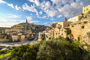 Fototapeta na wymiar View from the convent of Saint Agostino a traffic drives down the main road through the ancient city of Matera, Italy.