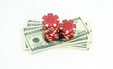 Poker chips and dollar Money bills. Isolated on white background 