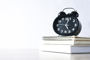 Alarm Clock Black Numeric White Put on a white book