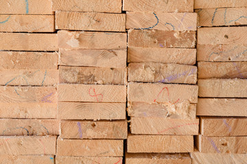 Fototapeta premium Background ends of the boards. The ends of the lumber. Pine ends. Wood background.