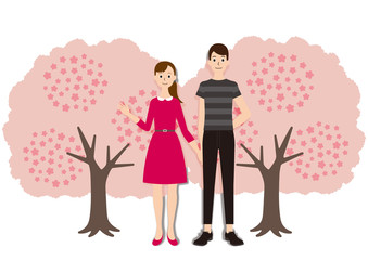 お花見で桜を楽しむカップル