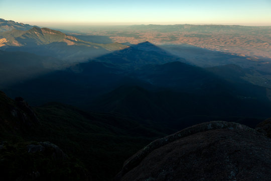 Triangular shadows of a mountain seen from the summit in mantiqueira range - Brazil