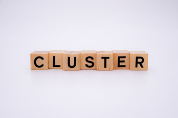 Cluster Word Written In Wooden Cube