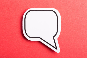 Speech Bubble Isolated On Red Background