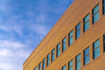 Modern building exterior under bright blue sky