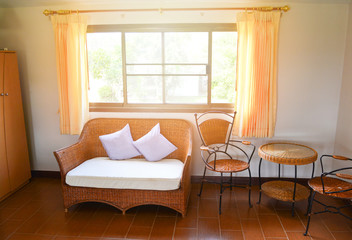 Rattan sofa interior design and set table chair living home and light from windows bright room in the house