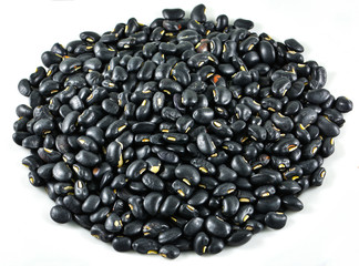 Pile of Black bean grain seeds isolated on white background