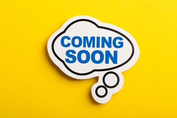 Coming Soon Speech Bubble Isolated On Yellow Background