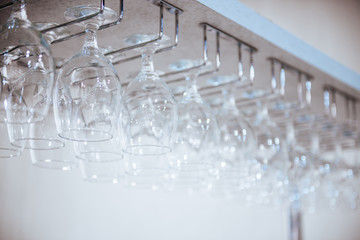 Stylish light background. Blurred glasses with bokeh