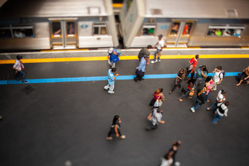 Obraz premium Mockup model style urban landscape - people on subway train platform - real tilt-shift TS lens