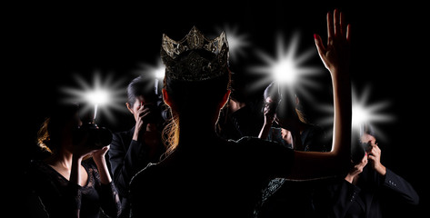 Back side view of Miss Pageant beauty contest with Silver Diamond Crown wave hand to many Photographers who shoot photo image to celebrity at red carpet event, and flash fire light came out copy space © Jade