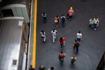 Obraz premium Mockup model style urban landscape - people on subway train platform - real tilt-shift TS lens