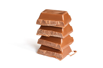 Tasty milk brown chocolate close-up isolated on white background