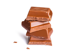 Tasty milk brown chocolate close-up isolated on white background